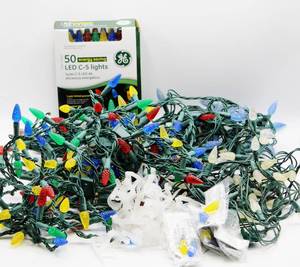 lot 1759 image: (4) LED C-5 Outdoor Light Sets - one is new in box, gutter clips and replacement bulbs included