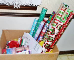 lot 1763 image: HUGE Christmas Wrapping Paper, Gift Bags, Tissue Paper, Clothing Boxes, Several Boxes Christmas Cards, Gift Tags, Ribbon, Bows....