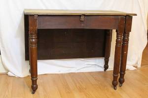 lot 1550 image: Antique Farmstyle Gateleg KitchenDining Table