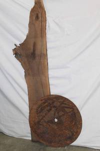 lot 1680 image: Slab of Cherry Wood and Old Farm Tiller Disc