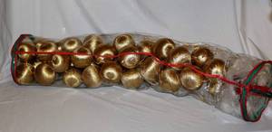 lot 1751 image: Large Holiday Storage Bag full of Golden Balls