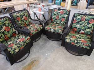 lot 7146 image: 4 matching swivel rocker wicker patio chairs.
