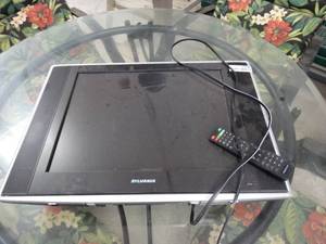lot 7148 image: Sylvania TV and remote.