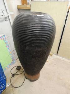 lot 7161 image: Large plastic fountain yard decor.