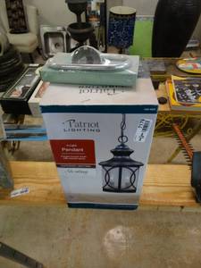 lot 7179 image: Outdoor light fixture and hanger.