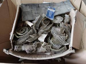 lot 7235 image: Box of nail gun strips.