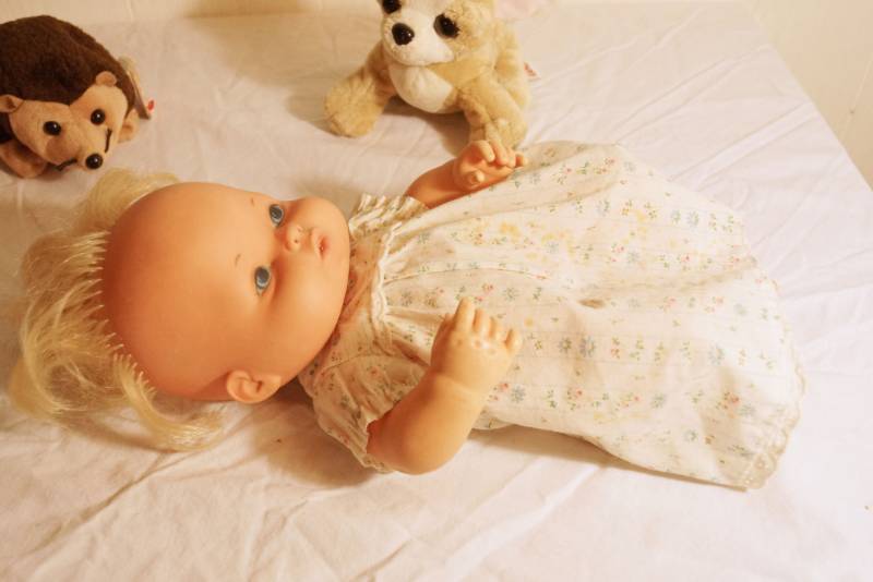 lot 1461 image: 1974 Mattel Baby Tender Love Doll-Toilette sign-puppy -hedgehog- When you squeeze her she cries and sneezes.