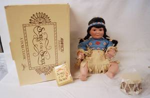 lot 4375 image: Gorgeous Porcelain Native American Doll