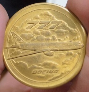lot 4416 image: Collectible Boeing 777 Airplane Coin - Neat Find