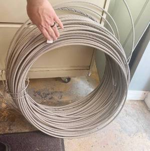 lot 4498 image: Large Roll of Aluminum Cable Wire - See pics - Estimate about 300 to 375 of cable - actual length unkown