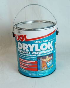 lot 2643 image: Ugi Drylock Masonry Waterproof Paint - Can was opened and a tiny bit was used. Not dried out. Almost FULL