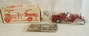 lot 4532 image: ERTL Eastwood Limited Edition Fire Department Tanker Bank