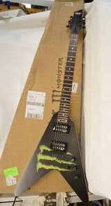 lot 2168 image: Schecter Monster Guitar - Brand New and Awesome - with Box