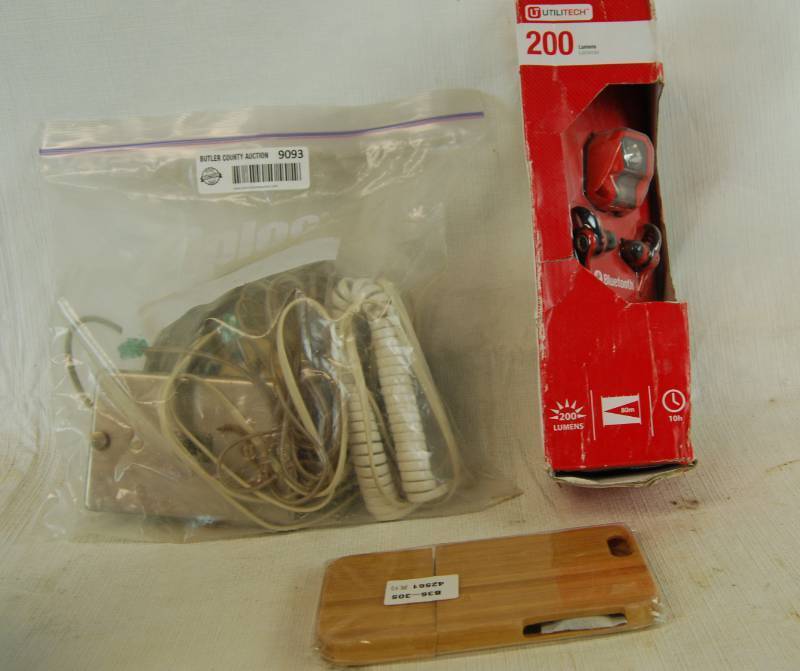 lot 4050 image: Phone Accessory Lot - Blue Tooth Headphones and Head Lamp New in Package, Bamboo IPhone case and More