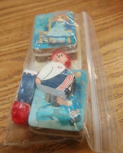 lot 4062 image: Kitchen Sign, Raggedy Ann &amp Andy Collectibles, Rose Handled Drawer Pulls,&nbsp Leonard Candle Snuffer in the Box