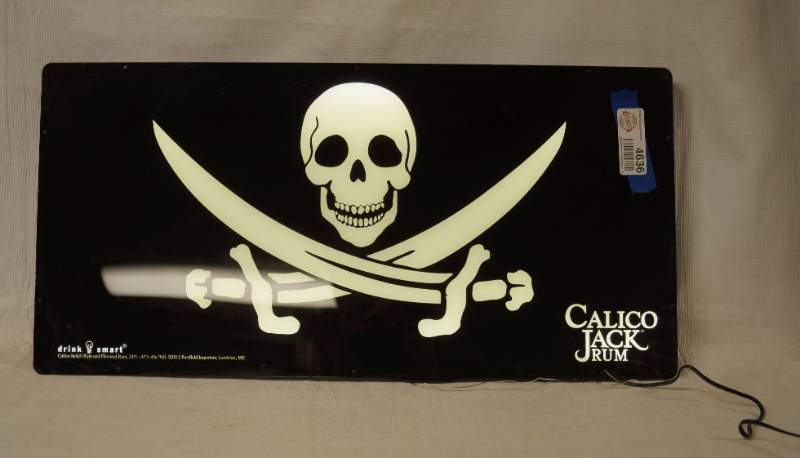 lot 4636 image: Wall Hanging Pirate Light Up Sign