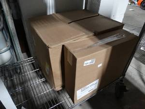 lot 2243 image: Case of 4 new jumbo roll dispensers