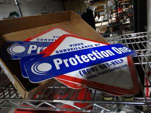 lot 2245 image: 3- Protection One security system signs
