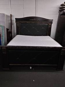 lot 5190 image: Beautiful Ashley Signature Series King Size Bed with Padded Leather Headboard and Footboard. WOW