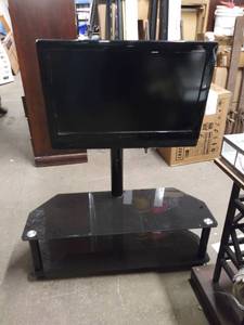 lot 5215 image: 32 Element Flat Screen Tv with Stand