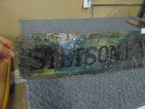 lot 3294 image: Stetson Hats Sign - Enamel - Appears to have been Heated - warped and Burnt