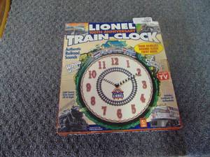 lot 3297 image: Lionel 100th Anniversary Train Clock