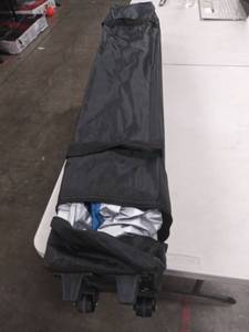 lot 2512 image: Canopy In Rolling Bag