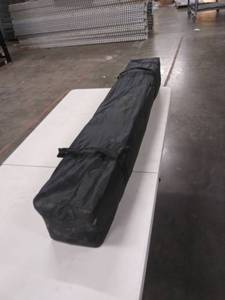 lot 2523 image: Canopy In Rolling Case.