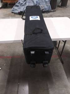 lot 2570 image: Z Shade Instant Gazebo In Rolling Case.