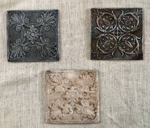 lot 2297 image: Set of 3 Painted Antique Ceiling Tiles mounted on wood frame