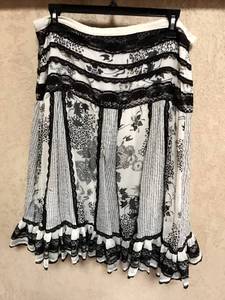 lot 2330 image: Black and White ruffled Skirt