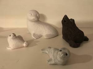 lot 2406 image: Seals and sea lion figurine