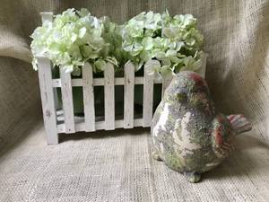 lot 2423 image: Garden Decor--Large wood basket with blooming hydrangea and ceramic bird