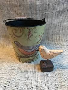 lot 2469 image: Birds--tin bucket and small wooden bird figurine