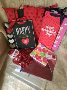 lot 2489 image: Set of 10 Valentines Day gift bags (including wine bags) along with clear treat bags and some other holiday goodies