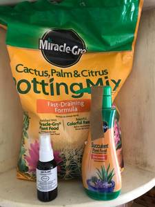 lot 2530 image: Assortment of plant food for air plants and succulents and cactus soil (all new)