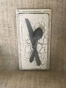 lot 2561 image: Creative Wall Decor with silver wear and crackle wood background