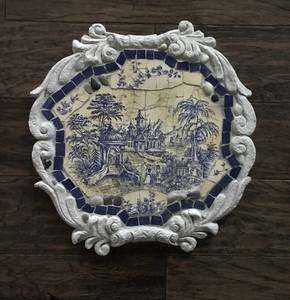 lot 2575 image: Mosaic stepping stone in blue and yellow (base is resin)