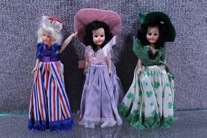 lot 2700 image: Lot of 3 Little Darling Dolls St. Patricks Day, Easter, and 4th of July Themed Dolls.