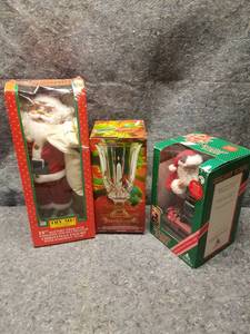 lot 14197 image: Two Santa Claus Figures and Crystal Candle Holder