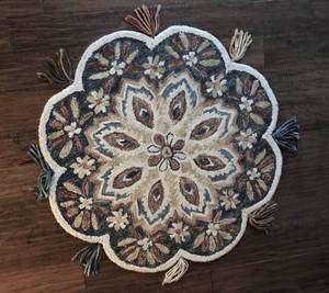 lot 2909 image: Remy Multi colored InkRust tones 3ft x 3 ft round carpet with tassels