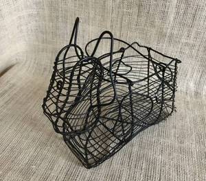 lot 2978 image: Black wire farmhouse basket shaped like a cow