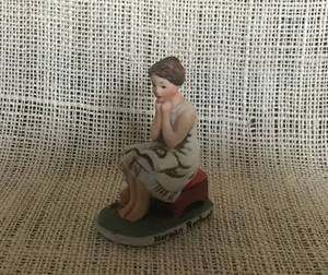 lot 3120 image: Vintage Norman Rockwell 1973 Porcelain Young Woman Figurine--design by Dave Grossman