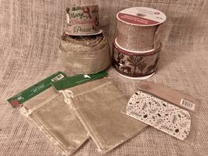 lot 3157 image: Assortment of Holiday small gift bags, ribbon and tags