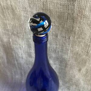 lot 1035 image: Glass Wine Bottle Topper---14 blue glass wine bottle included