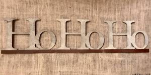 lot 1068 image: 32 Tin HoHoHo sign