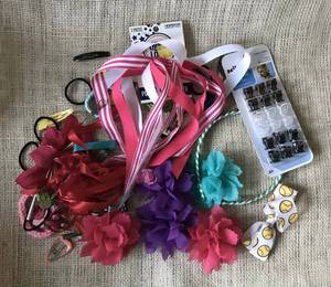 lot 1104 image: Assortment of hair clips, bands, ribbons, etc.