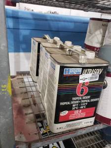 lot 3023 image: 4 Gallons of Reducer
