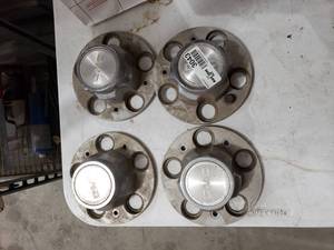 lot 3043 image: 4 GMC Hubcaps