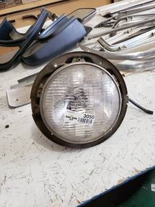lot 3050 image: V.W. Headlight